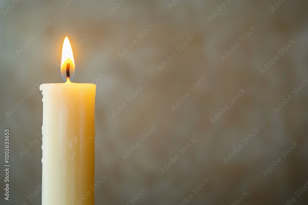 A candle flickers softly in a quiet space sukkot yom kippur A candle flickers softly in a quiet space sukkot yom kippur