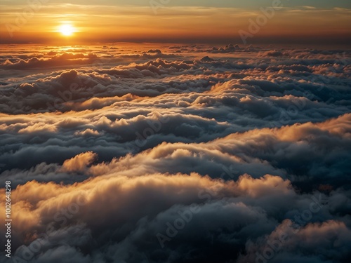 Sunset above the clouds.