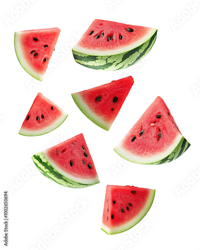 Fresh watermelon slices soaring through the air in a summer display photo