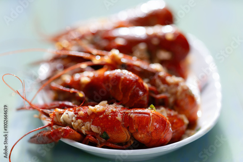 Obraz na płótnie plate of traditional garlicky spicy sichuan red crawfish w salonie