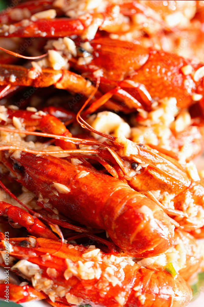 plate of traditional garlicky spicy sichuan red crawfish