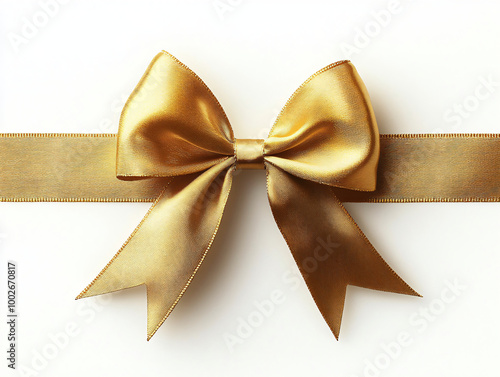 Decorative shiny atlas gold ribbon with bow isolated on white background. Yellow band satin strip for Valentine's, birthday gift. Wrapping for Christmas party, Father's, Women's day  gift.  photo