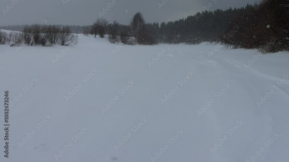 Zimnik. Siberian temporary winter road, snow-and-ice road on a frozen river. Snowdrifts on the sides of the road Zimnik. Siberian temporary winter road, snow-and-ice road on a frozen river. Snowdrifts on the sides of the road