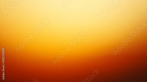 Blurred gradient amber to ochre abstract background