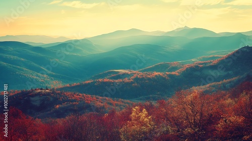 Misty mountain landscape with fall foliage.