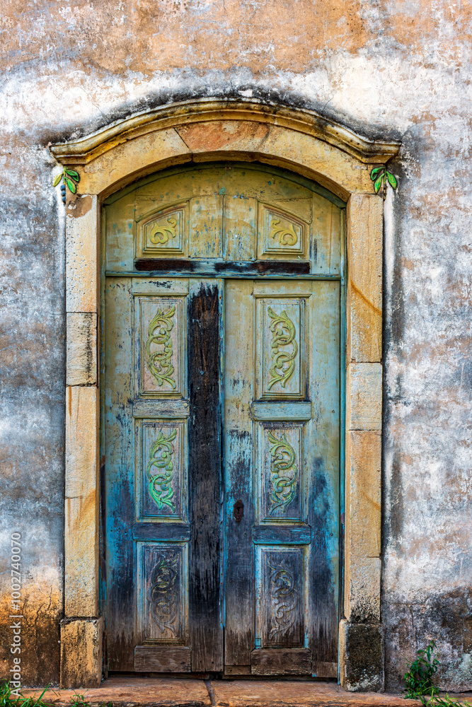 Carved wooden door in an old baroque church in the city of Ouro Preto in Minas Gerais Carved wooden door in an old baroque church in the city of Ouro Preto in Minas Gerais