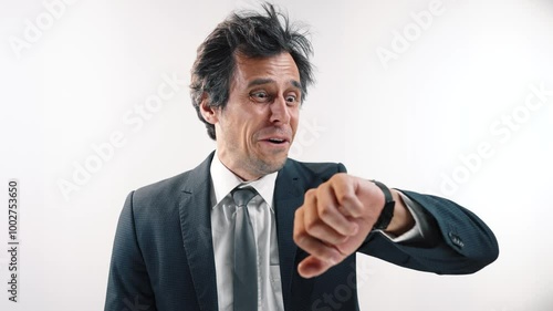 Funny businessman looks at his watch and shouting