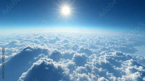 A bright morning sky above the clouds, with a rich blue sky