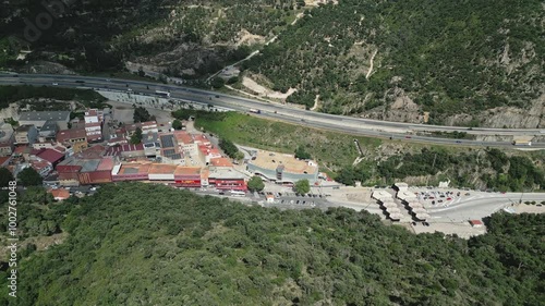 Aerial view of Le Perthus Neighborhood Highway traffic borders Spain and France photo