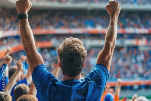 Vibrant soccer match scene from behind the action, capturing a triumphant player raising arms in celebration amidst a sea of cheering fans in a packed stadium.