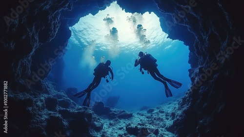 Wallpaper Mural Diver exploring underwater rocky cave in deep sea. Torontodigital.ca