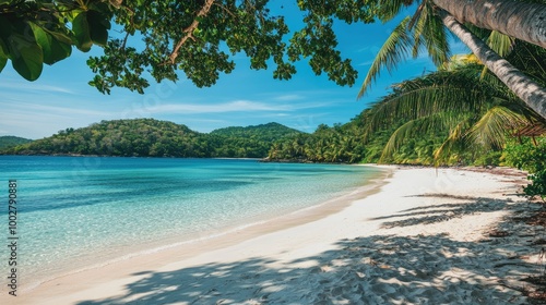 Empty tropical beach with white sand and crystal-clear water, space for text or branding