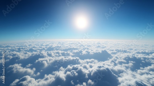 Above the clouds, with a rich blue sky