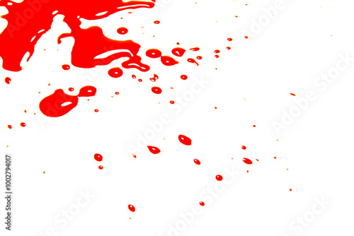 A drop of red ink, like a drop of blood isolated on transparent background. photo