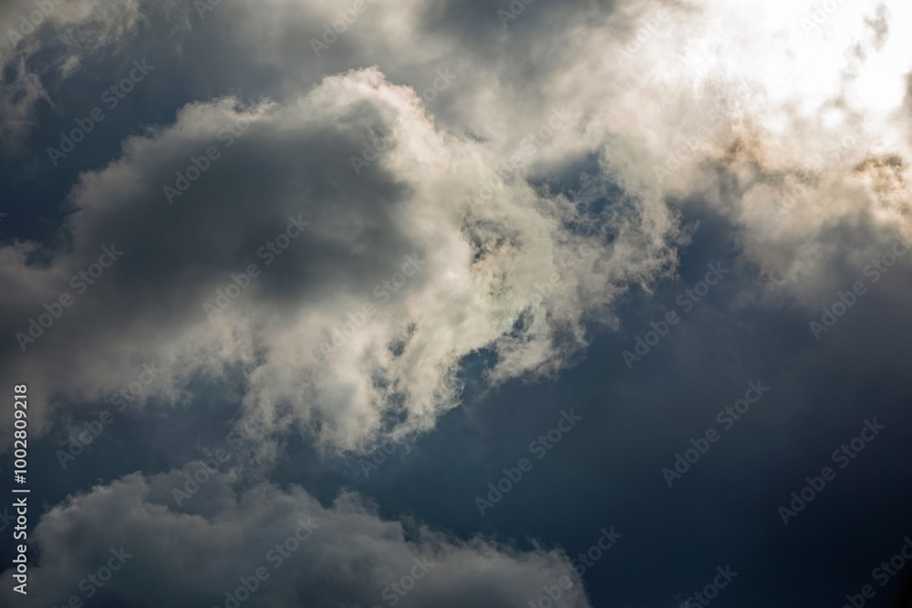 Gathering Storm Clouds Illuminated by the Sun Gathering Storm Clouds Illuminated by the Sun