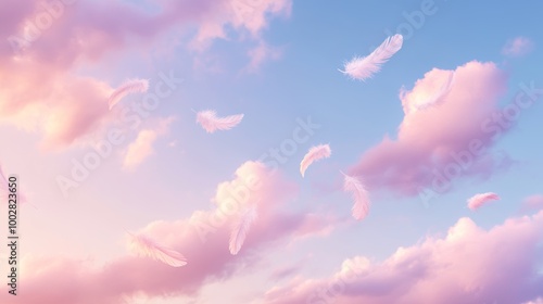 A romantic dusk sky with a few clouds shaped like feathers, floating gently across a pastel-colored horizon photo