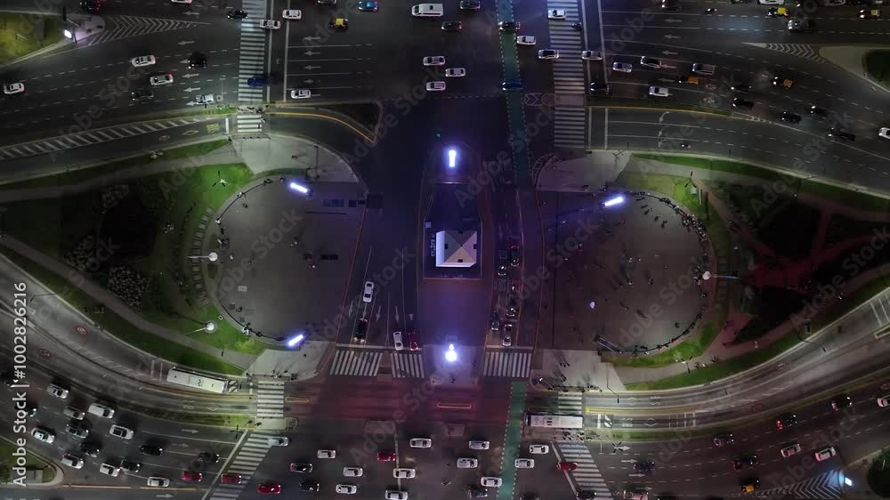 Aerial view of the Buenos Aires Obelisk at night. Zenithal view over the traffic. Aerial view of the Buenos Aires Obelisk at night. Zenithal view over the traffic.