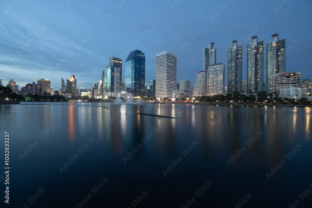 Fototapeta premium Twilight time at the business district from Benjakiti Park Bangkok , Thailand