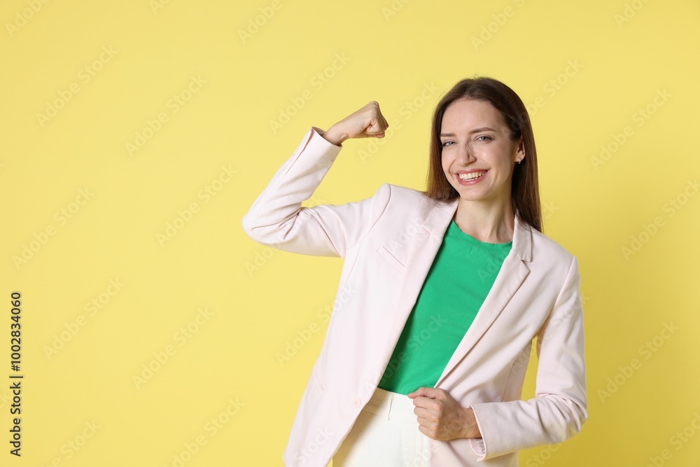 Happy winner on yellow background, space for text Happy winner on yellow background, space for text