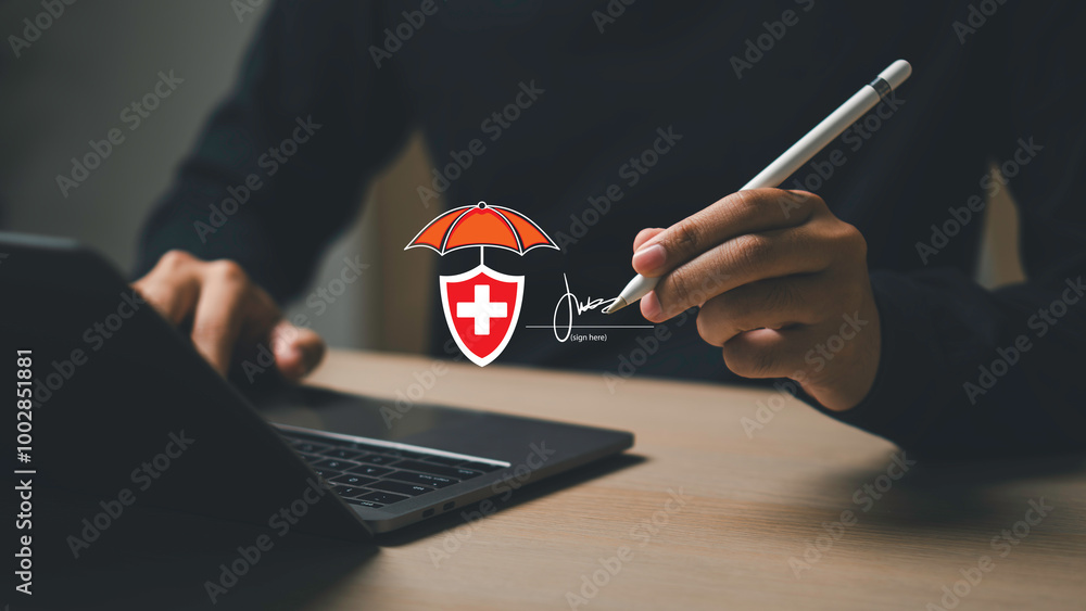 Purchasing insurance concept, A person is signing insurance a document on a laptop. protect for medical, life, car, home, travel.