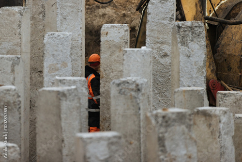 Pile foundation at construction site. Concrete piles. 
