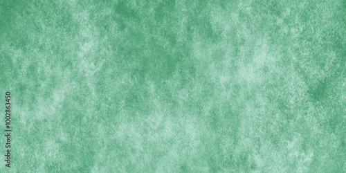 Abstract Elegant dark green background with mottled vintage texture in old fancy background design, texture of colored parchment paper.