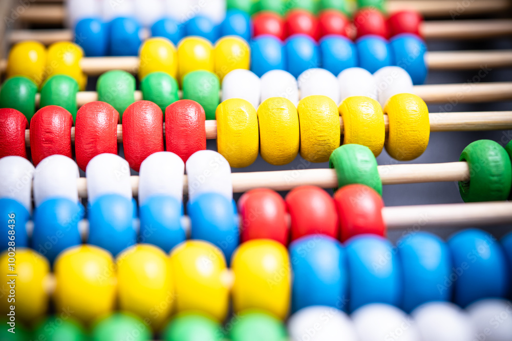 Vibrant Educational Abacus Close-Up, Showcasing Colorful Beads for Engaging Learning and Child Development in Mathematics and Counting Skills Vibrant Educational Abacus Close-Up, Showcasing Colorful Beads for Engaging Learning and Child Development in Mathematics and Counting Skills