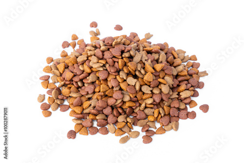 Pet treats with contains essential flavors and nutrients. Cat crunchy biscuits. Pile of dry cat food pellets come in heart, triangle and fish shapes isolated on white background.