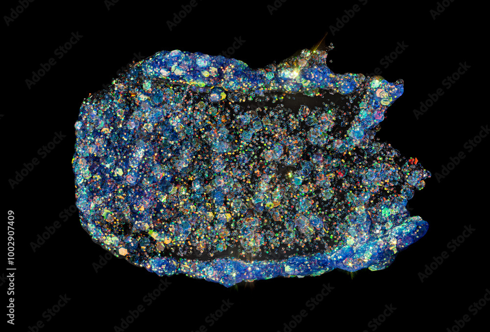 Blue holographic shimmering glitter or eye shadow smudge texture on black background..