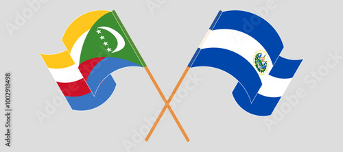 Crossed and waving flags of the Comoros and Republic of El Salvador. Vector illustration