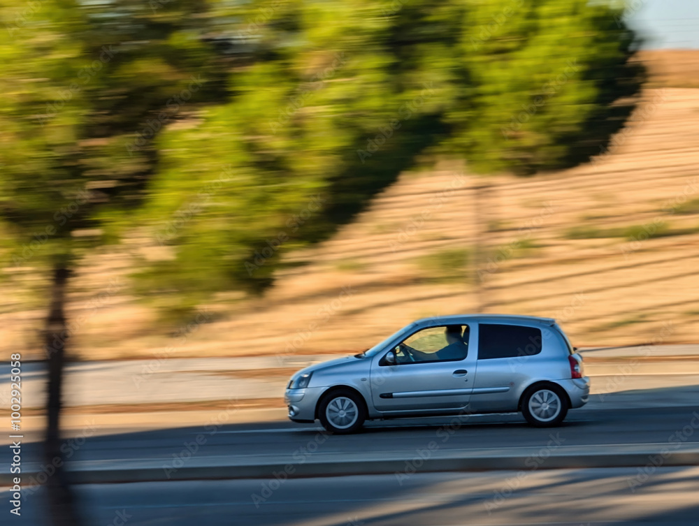 Fototapeta premium car, day, vehicle, transport, passenger, panning, blurry backgro