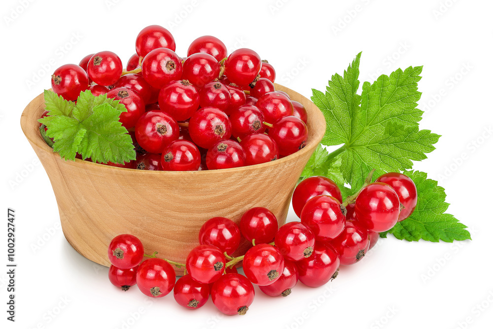 Red currant berries in a wooden bowl isolated on white background Red currant berries in a wooden bowl isolated on white background