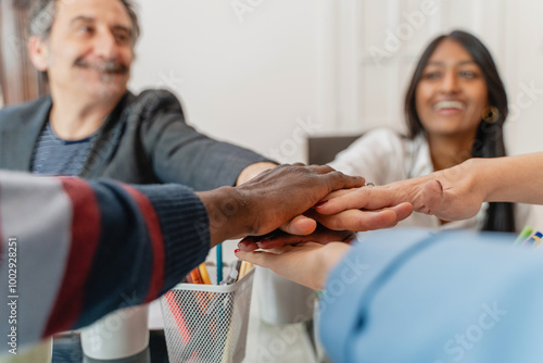 Photography Diverse team unity, multiethnic colleagues joining hands, workplace inclusion an