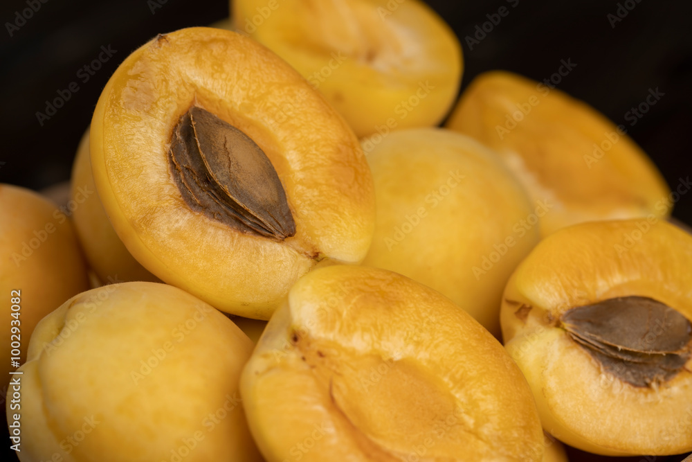 ripe soft apricot fruits on the cutting board ripe soft apricot fruits on the cutting board