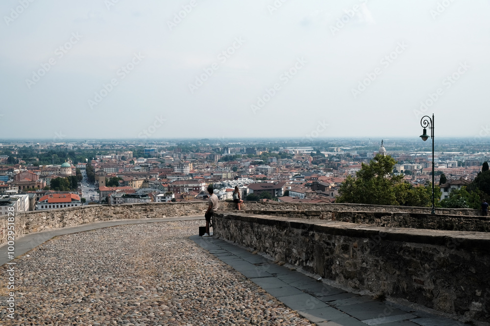 Venetian Walls in Citta Alta, Upper Town and beautiful view with rooftops of the Lower Town Bergamo, Lombardy region, Italy Venetian Walls in Citta Alta, Upper Town and beautiful view with rooftops of the Lower Town Bergamo, Lombardy region, Italy
