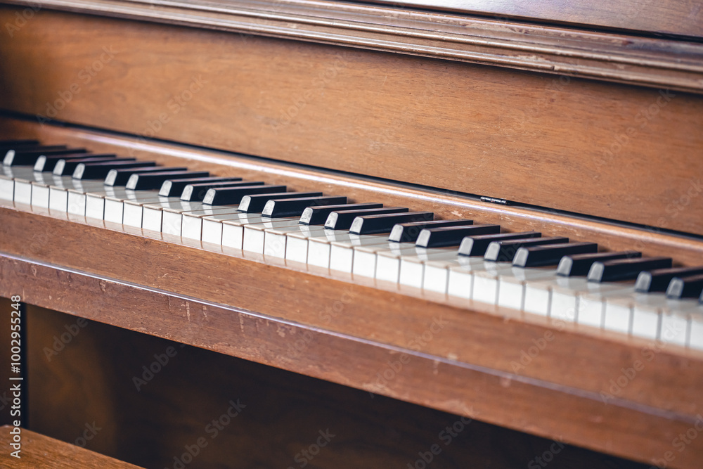 Piano keys on wooden brown musical instrument. Piano keys on wooden brown musical instrument.