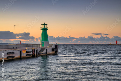 Wallpaper Mural Green lighthouse on the western breakwater in Nowy Port at sunset, Gdansk. Torontodigital.ca