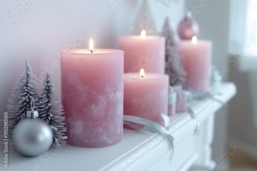 create a cozy yet stylish atmosphere with soft pink scented candles, silver ribbons, and minimalist christmas figurines on a white mantlepiece photo