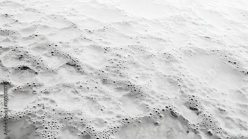Numerous tiny droplets of rain adorn a smooth, monochrome expanse, forming an intricate and abstract pattern. 