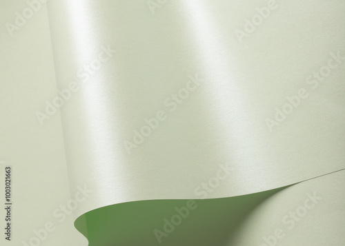 Pastel gradient designer paper with frosted mint and ivory green tones. The abstract, wavy shapes create a soft, fluid texture with a chic, glossy sheen. This clean and elegant