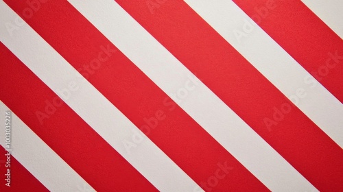 Striking red and white diagonal stripes create a bold visual pattern suitable...