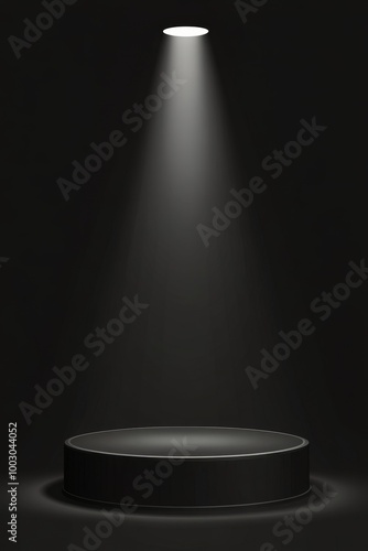 A spotlight beams on a circular stage in a dim venue for a performance