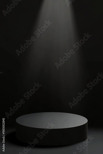 A spotlight beams on a circular stage in a dim venue for a performance