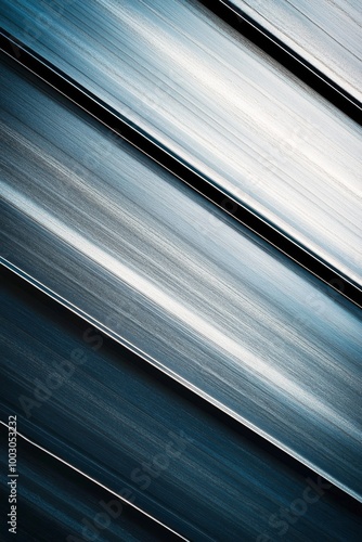 Shiny metal surface with elegant grooves reflecting light in modern industria...