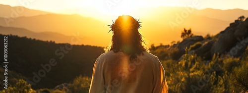 Jesus Christ with a crown of thorns on his head, seen from behind, looking at the sun in a mountainous landscape