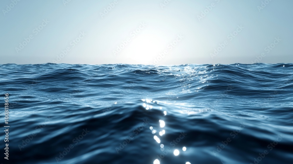 Fototapeta premium The ocean is calm and the sun is shining on the water