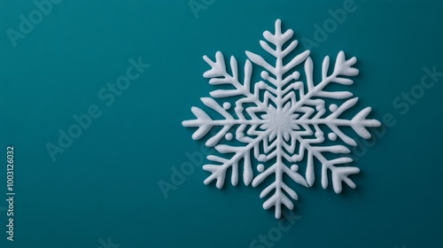 Isolated snowflake with surreal swirls and spiral shapes, delicate crystal structure on a deep teal gradient 