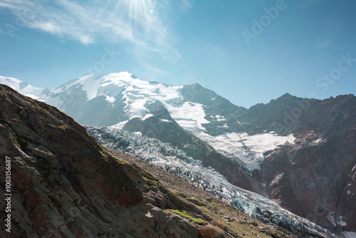 Panorama of alps. Extreme sports in mountains. High resolution photo. Ski, parasailing, paraglide, climbing, alpinism, snowboard in Chamonix Mont Blanc.