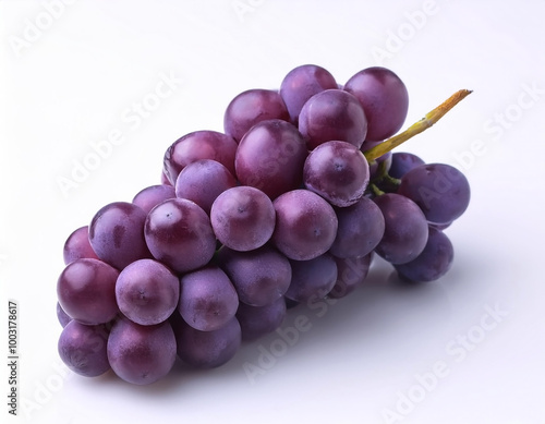 A bunch of purple grapes with one separate grain, focus on the skin texture isolated on white background