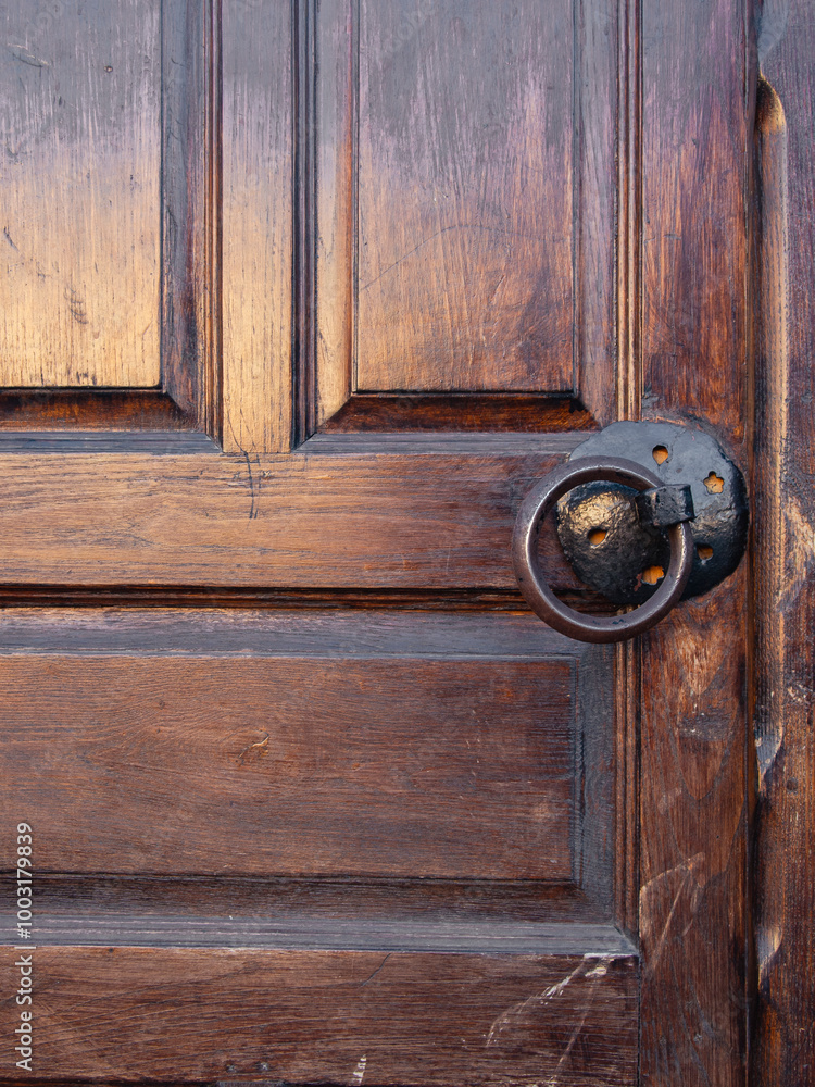 old wooden door and door handle of a historical building old wooden door and door handle of a historical building